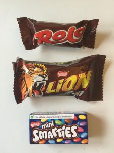 A selection of three types of British sweets given out at Halloween.
