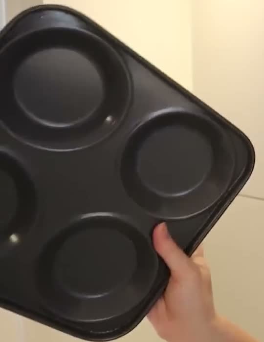 Black Yorkshire pudding tray with shallow round wells